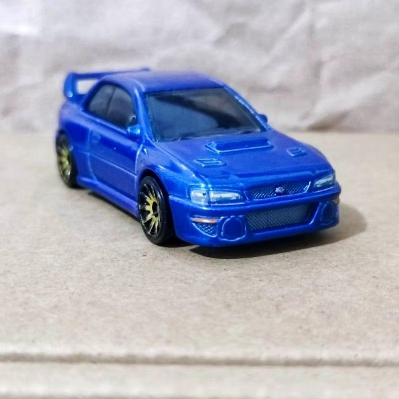 Hot Wheels 98 Subaru Impreza 22b Sti version (Category: Vehicle & Diecast Models) located in Angeles City. Submitted by yellowbrickstore (Listing ID 1320310813, Image 2). Description: READING IS ESSENTIAL Basa Basa po muna bago DM fbpage yellowbrick store - price : FIXED napo tayo - Availabile Pa Ba? : YES (no reply for this question nasagot na) - Payment: GCASH,BPi bank gotyme - Shipping: JNT sat only or LBC cop mon - sat - hm shipping? - See pi