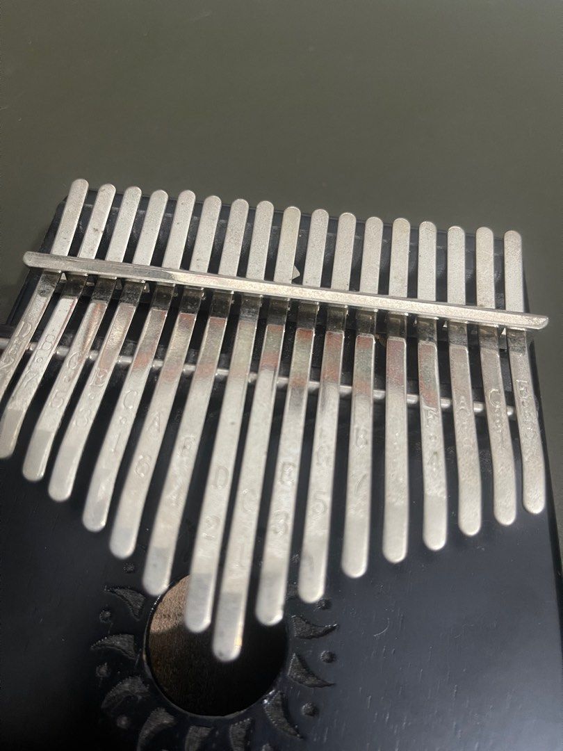 Kalimba - black wooden (Category: Musical Instruments) located in Quezon City. Submitted by jadeeclutterz (Listing ID 1320367646, Image 2). Description: READ UNTIL END: Wooden kalimba Purchased from Ben & Bart Has engraving of my pet’s name, pero generic naman Some marks sa metal due to exposure sa air nama-display lang kasi minsan) Including original pouch, tuning hammer, and box Note: - Posted price = LAST PRICE - Amount is negotiable ONLY IF y