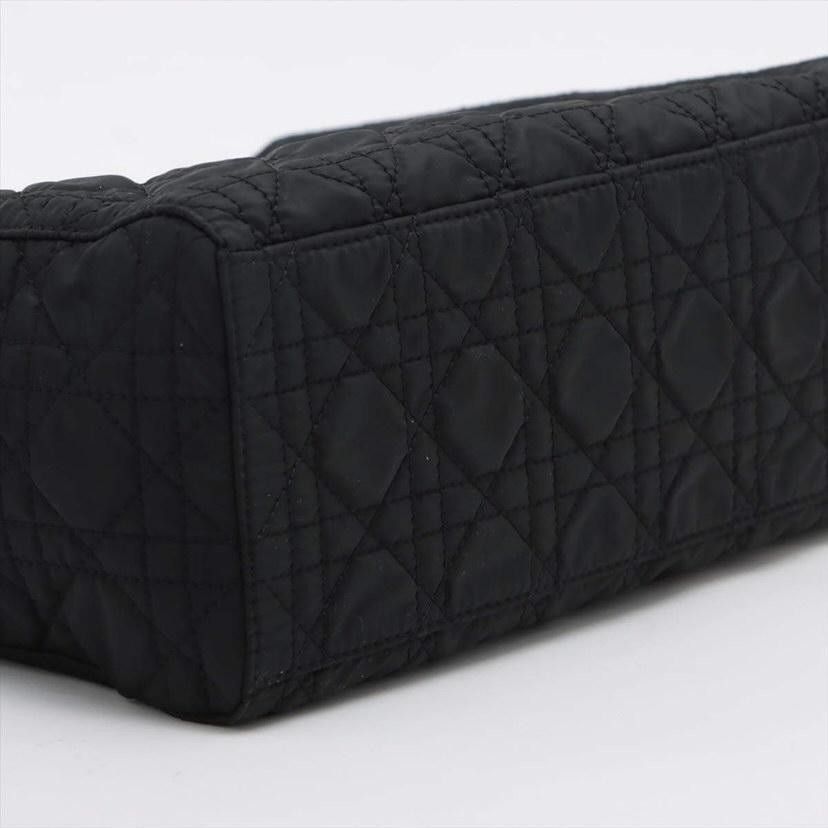 Lady Dior Cannage Nylon Medium (Vintage) (Category: Luxury Bags & Wallets) located in Quezon City. Submitted by ten.ten2504 (Listing ID 1320393044, Image 3). Description: Lady Dior Cannage Nylon Medium (Vintage) Condition: Very good, signs of use on handle Inclusion: None (no strap).