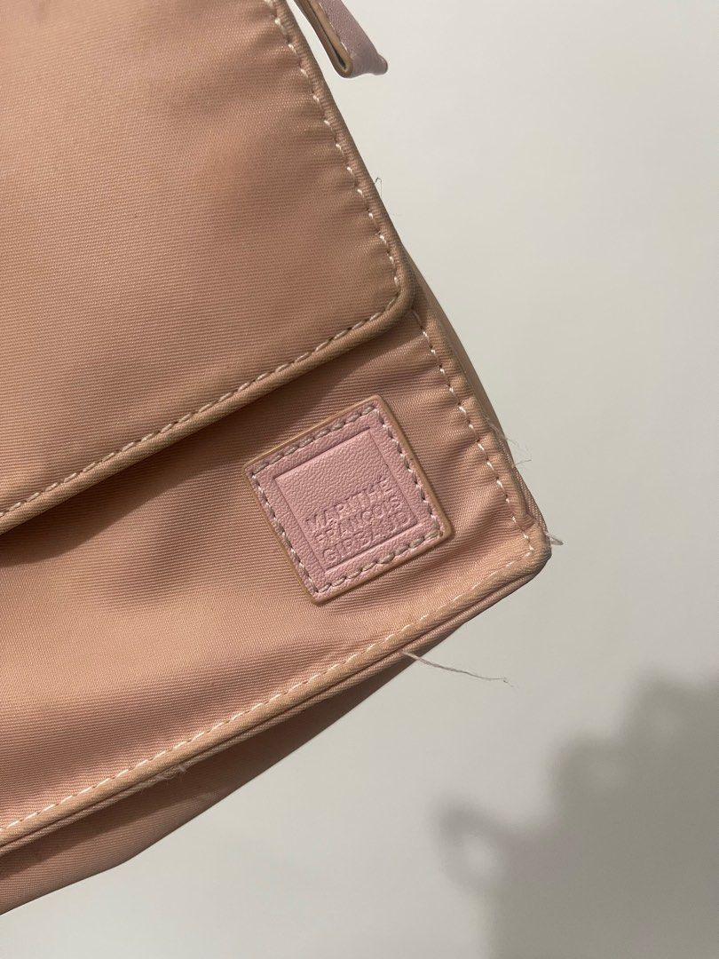 Marithe + Francois Girbaud pink small bag (Category: Cross-body Bags) located in Quezon City. Submitted by jadeeclutterz (Listing ID 1320346338, Image 3). Description: Pink body bag Need lang labhan but no flaws. All stitches intact. No repairs made. 8 inches wide 6 inches tall 1.5 inches thick.