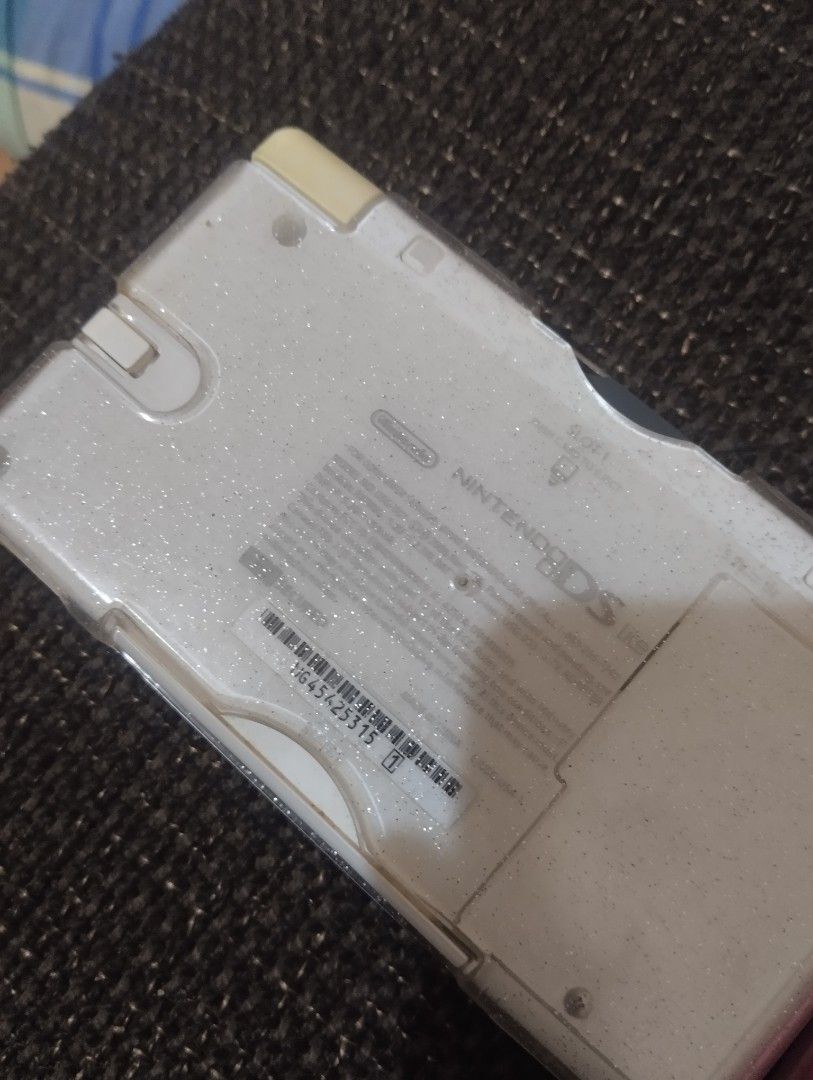 Nintendo ds lite with defects set (Category: Nintendo) located in Baguio. Submitted by clumzy.v2 (Listing ID 1320325655, Image 3). Description: white has screen lines on touchpad, and needs to replace both of the screen all buttons working well with stylus no r4, no charger, with case. pink has a little scratch looks brand new all buttons working properly touchscreen needs to be recalibrated or replaced with stylus and case no charger no r4 skybl