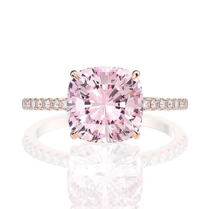 Pink sapphire engagement ring. (Category: Rings) located in Taguig. Submitted by little_toto (Listing ID 1320235472, Image 3). Description: This engagement ring features a pink sapphire stone set in a rose gold-plated sterling silver band (S925). A sparkling white stone accents each side of the ring. This romantic ring is the perfect choice for someone looking for a colorful engagement ring. Metal: Sterling silver, S925. Metal polish: Rose gold. 