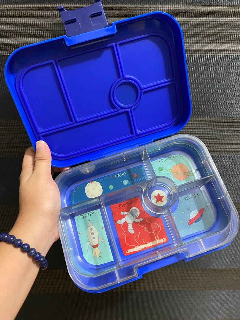 Yumbox Original (Category: Food Organization & Storage) located in Valenzuela. Submitted by mercurialmomma (Listing ID 1320394123, Image 2). Description: Original Yumbox bought directly from Bright Brands With signs of usage (I can remove the sticker and have it cleaned before shipping out) RFS: Switched to Bollie bec mas konti compartment 🥲 800php na lang (almost half the price I paid for) Location: Valenzuela City #Yumbox #lunchbox #bentobox #