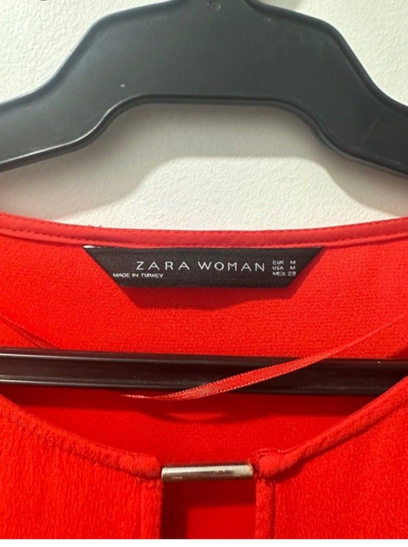 Zara Red Orange Formal or Casual Top (Category: Blouses) located in Pasig City. Submitted by itsdeclutter_time (Listing ID 1320315164, Image 2). Description: medium size when laid flat: amrpit 18" length 25" red orange 9/10 color very chic & elegant MOP: gcash/bpi Shipping c/o buyer pick up: taguig/pasig last price posted.