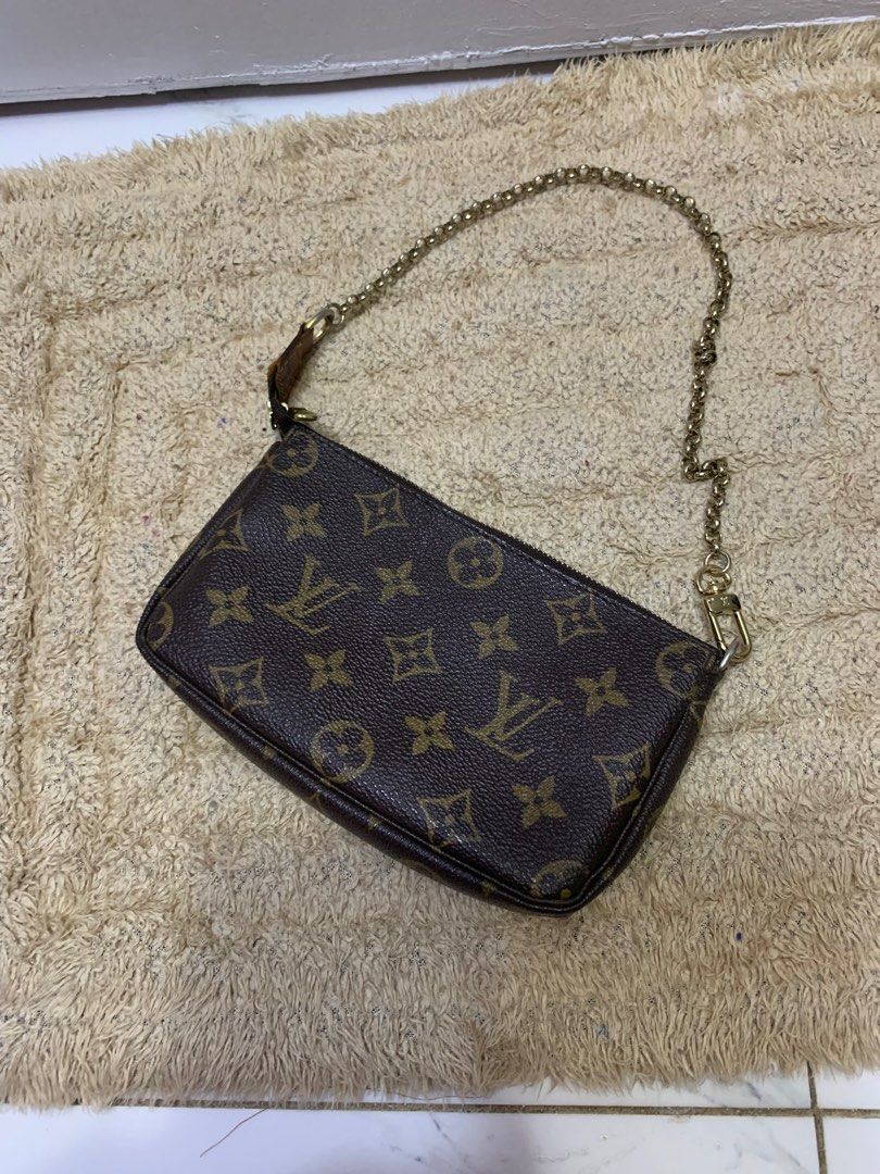Authentic Louis Vuitton Mini pochette (Category: Luxury Bags & Wallets) located in Quezon City. Submitted by maefurio (Listing ID 1320548400, Image 3). Description: ❗️100% authentic money back if proven fake❗️ 👉🏻NEGOTIABLE FOR SURE BUYER 👉🏻replaced vachetta strap with authentic chain strap also from LV .