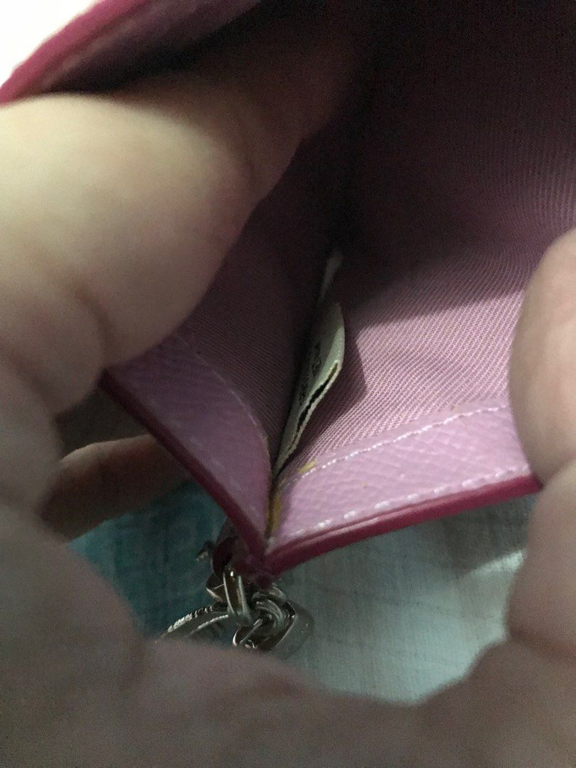 Coach Multicolor Card Holder (Category: Luxury Bags & Wallets) located in Santa Rosa. Submitted by rina.rina3 (Listing ID 1320495472, Image 3). Description: Coach multicolored card holder Sourced from Korea With Coach hang tag, and 3 other charms (feather, padlock and key) Super cute in person Buyer to shoulder shipping fee Slightly negotiable .
