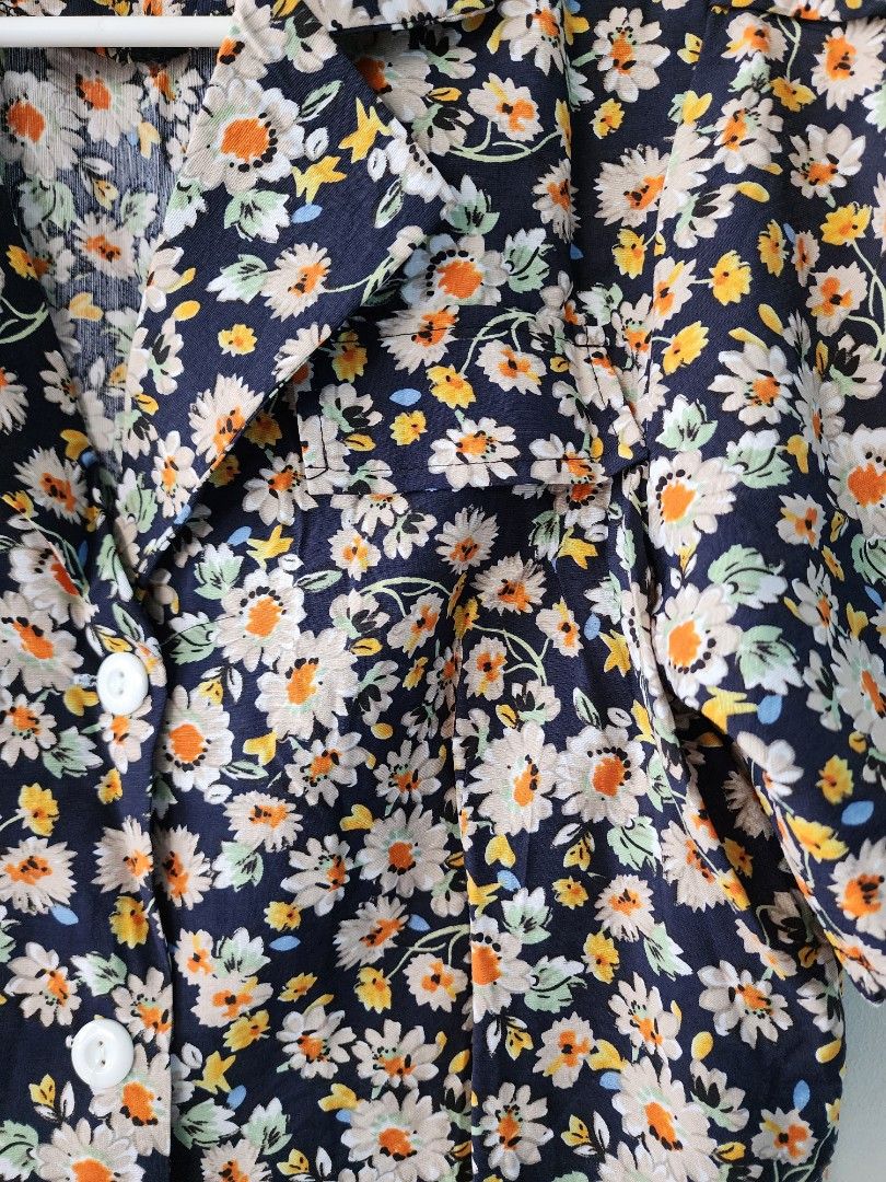 Floral Puff Sleeves Polo Top (Category: Blouses) located in Manila. Submitted by jenkto (Listing ID 1320551183, Image 3). Description: Brand new, bought in BKK. Puff Sleeves. Semi cropped length. Very very soft cotton fabric!.