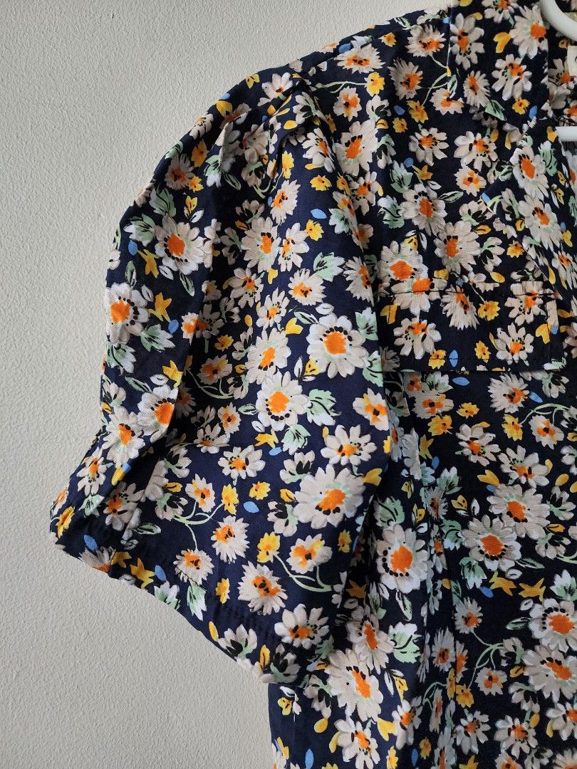 Floral Puff Sleeves Polo Top (Category: Blouses) located in Manila. Submitted by jenkto (Listing ID 1320551183, Image 2). Description: Brand new, bought in BKK. Puff Sleeves. Semi cropped length. Very very soft cotton fabric!.