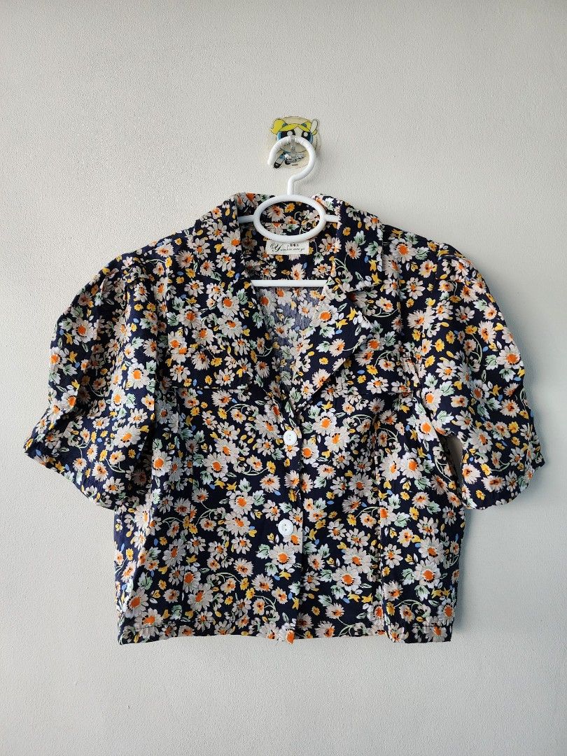 Floral Puff Sleeves Polo Top (Category: Blouses) located in Manila. Submitted by jenkto (Listing ID 1320551183, Image 1). Description: Brand new, bought in BKK. Puff Sleeves. Semi cropped length. Very very soft cotton fabric!.