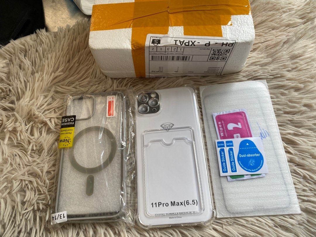 Iphone 11 Pro Max + Tempered Glass SALE (Category: Cases & Sleeves) located in Quezon City. Submitted by craftpark (Listing ID 1320419355, Image 1). Description: Iphone 11 Pro Max + Tempered Glass SALE Grey phone case - Iphone 13 Take all Brand new Reason to sell: wrong variant.