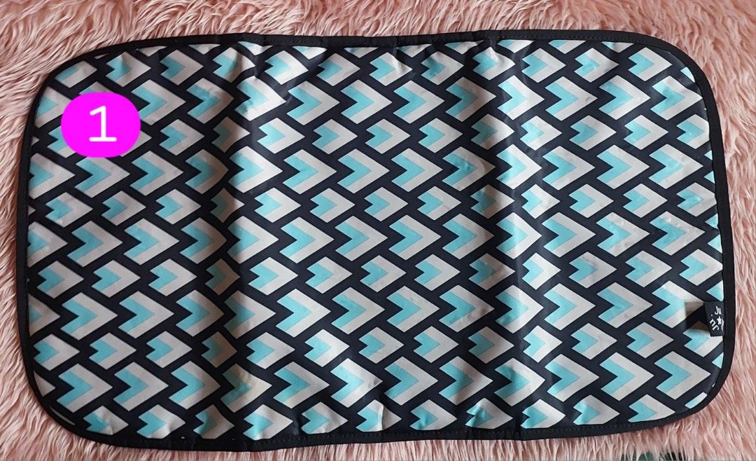 Jujube Change Pad (Category: Changing Mats & Accessories) located in Malabon City. Submitted by mom_of_three (Listing ID 1320568589, Image 1). Description: Price per piece. Can be used for customized bags.Never used. 1. Black Diamond- padded (SOLD) 2. Black - padded 3 and 4. Black - light, unpadded 5. Queen of the Nile (QOTN) - light, unpadded.