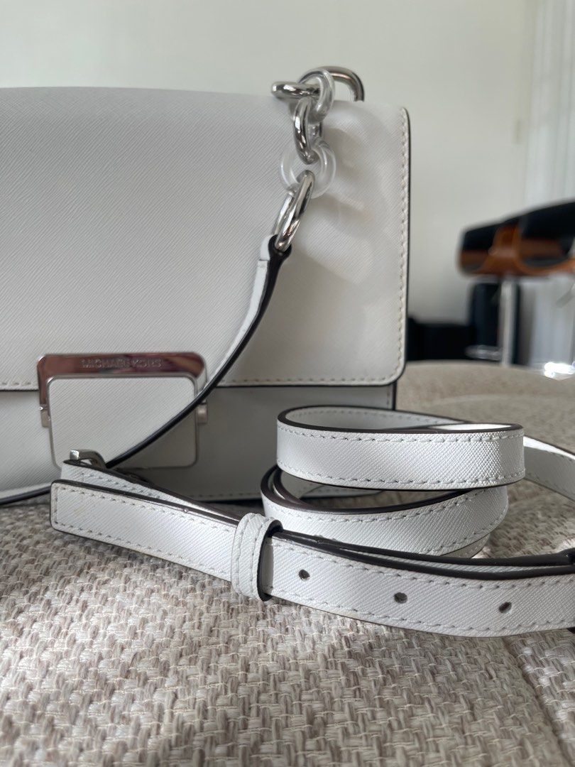 MK White Leather Small Cythia Shoulder Bag (Category: Luxury Bags & Wallets) located in Las Pinas. Submitted by angela_allyson (Listing ID 1320524577, Image 3). Description: Silver Hardware 2 sling available Good as New never been used Original Price: $226 Selling Price: 7,000.