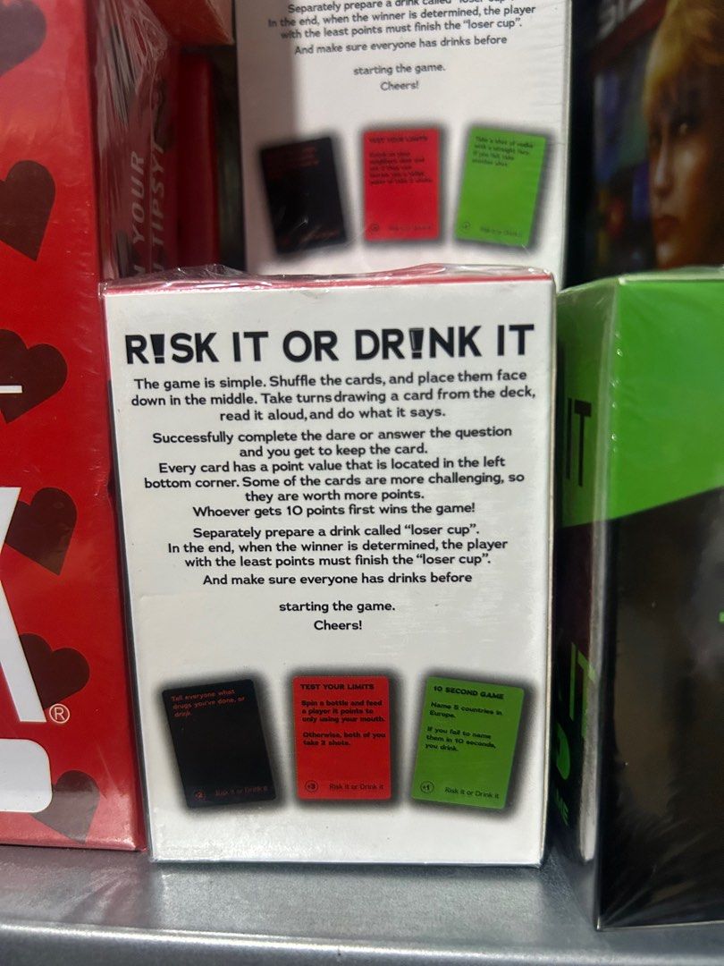 Risk It or Drink It- Card Game (green & red) (Category: Board Games & Puzzles) located in Manila. Submitted by cozzyessentialshopph (Listing ID 1320573681, Image 3). Description: Item: Risk It or Drink It - Card Game Price: P339 per pack Combo bundle: P599 Description: For those who love a good laugh, this card game is all about hilarious dares and outrageous questions. Get ready for a wild time! Have a blast with this fun drinking game at partie