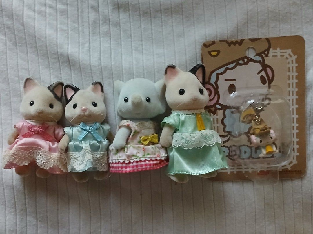 sylvanian families calico critters (Category: Figurines & Statues) located in Caloocan City. Submitted by beanbeano (Listing ID 1320561820, Image 1). Description: tuxedo cats - 300 ea elephant - 250 nego if payo/taking more than 1.