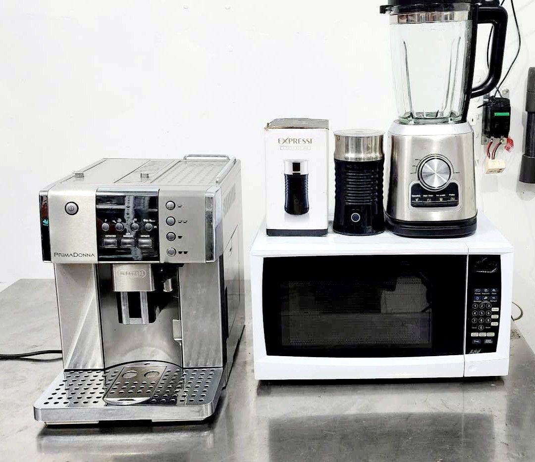 TAKE ALL DELONGHI FULLY AUTOMATIC ESPRESSO MACHINE PRIMADONA W/ MICROWAVE & BLENDER (Category: Coffee Machines & Makers) located in Bulacan. Submitted by iamvanillapeach (Listing ID 1320518430, Image 1). Description: Take all, in good condition. Ready to use. With 30 days service warranty. You can try all units if pick up. We also deliver nationwide. We have our own tech for aftersales.