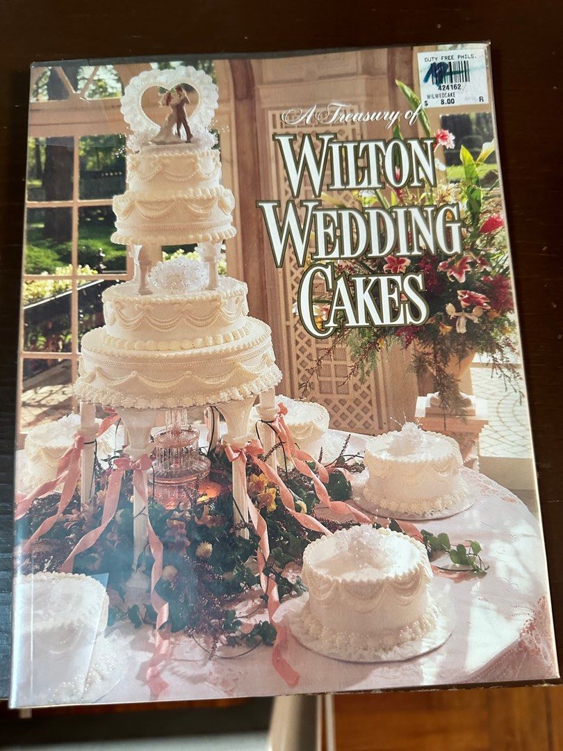 Wedding Cakes Designs (Category: Other Food & Drinks) located in Quezon City. Submitted by katzlee (Listing ID 1320466212, Image 1). Description: The exquisite cakes found in this book reflect the more than half a century of experience Wilton has in designing wedding cakes. Victorian to contemporary cakes for large or intimate weddings are showcased in this beautiful treasury. Each comes with complete instructions that make it easy for your baker