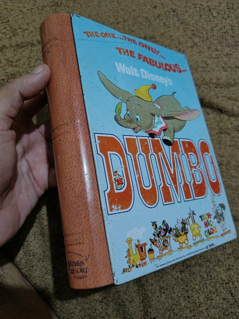 Disney's Dumbo book tin can case (Category: Children's Books) located in Quezon City. Submitted by markgolveo (Listing ID 1320657853, Image 2). Description: Disney's Dumbo book tin can case.