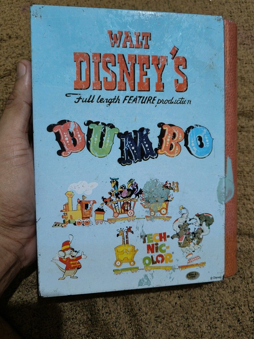 Disney's Dumbo book tin can case (Category: Children's Books) located in Quezon City. Submitted by markgolveo (Listing ID 1320657853, Image 3). Description: Disney's Dumbo book tin can case.