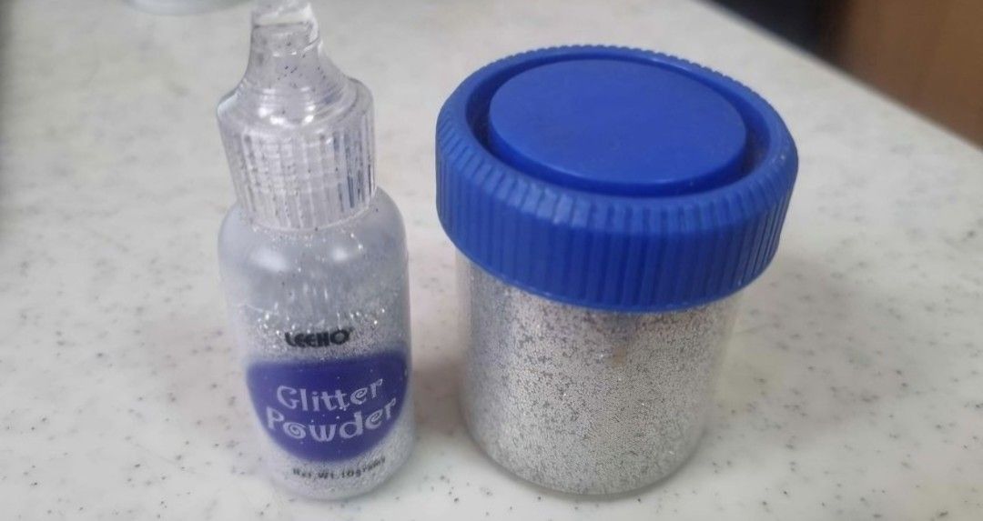 Glitters - light blue and silver (Category: Babies & Kids Fashion) located in Paranaque City. Submitted by declutterdin (Listing ID 1320635706, Image 2). Description: Light blue and silver glitters.