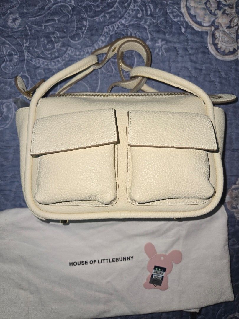 9.9 SALE HOLB BRICK GL (Category: Cross-body Bags) located in Mandaluyong City. Submitted by personallpreloved (Listing ID 1320738209, Image 1). Description: House of Little Bunny Brick.