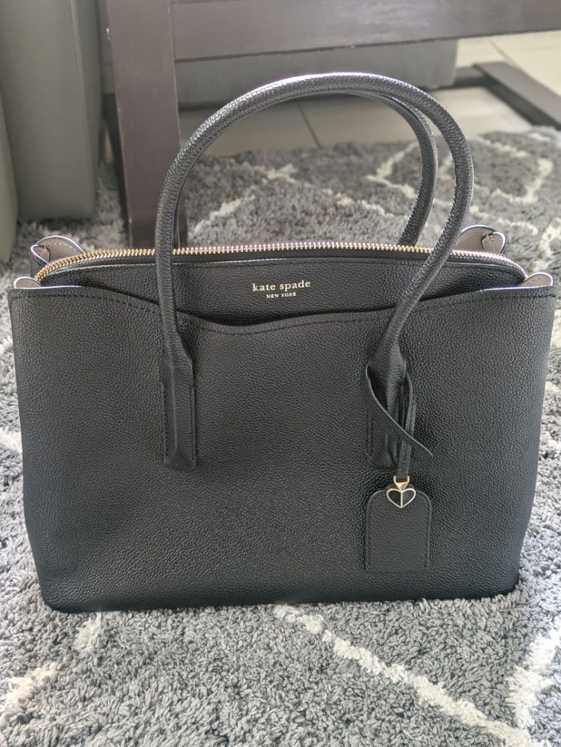 Kate Spade (Category: Luxury Bags & Wallets) located in Manila. Submitted by mai087228 (Listing ID 1320592180, Image 1). Description: Original Kate Spade bag bought from Canada Only used once kaya halos brand new comes with a dust bag Hand bag with strap bought for 14k rfs: can't see myself using it.
