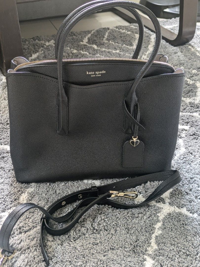 Kate Spade (Category: Luxury Bags & Wallets) located in Manila. Submitted by mai087228 (Listing ID 1320592180, Image 2). Description: Original Kate Spade bag bought from Canada Only used once kaya halos brand new comes with a dust bag Hand bag with strap bought for 14k rfs: can't see myself using it.