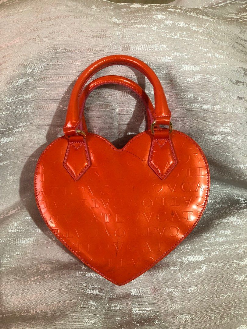 LOVCAT Orange Heart Bag (Category: Shoulder Bags) located in Angeles City. Submitted by Archive21 (Listing ID 1320702841, Image 2). Description: Good Condition with only minmal signs of wear.