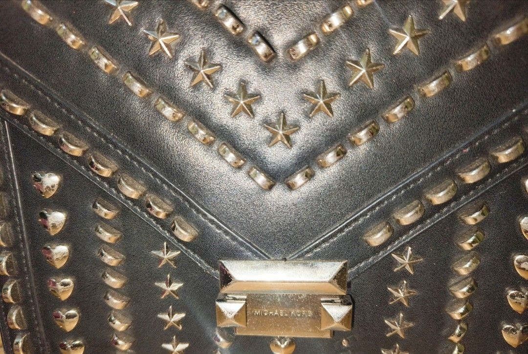 Michael Kors (Category: Luxury Bags & Wallets) located in Baguio. Submitted by luxeloom099 (Listing ID 1320695902, Image 3). Description: Michael Kors x yang mi Whitney bag studded sling bag minimal signs of usage.