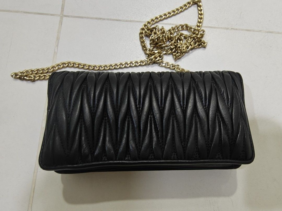 Miu miu wallet on chain top