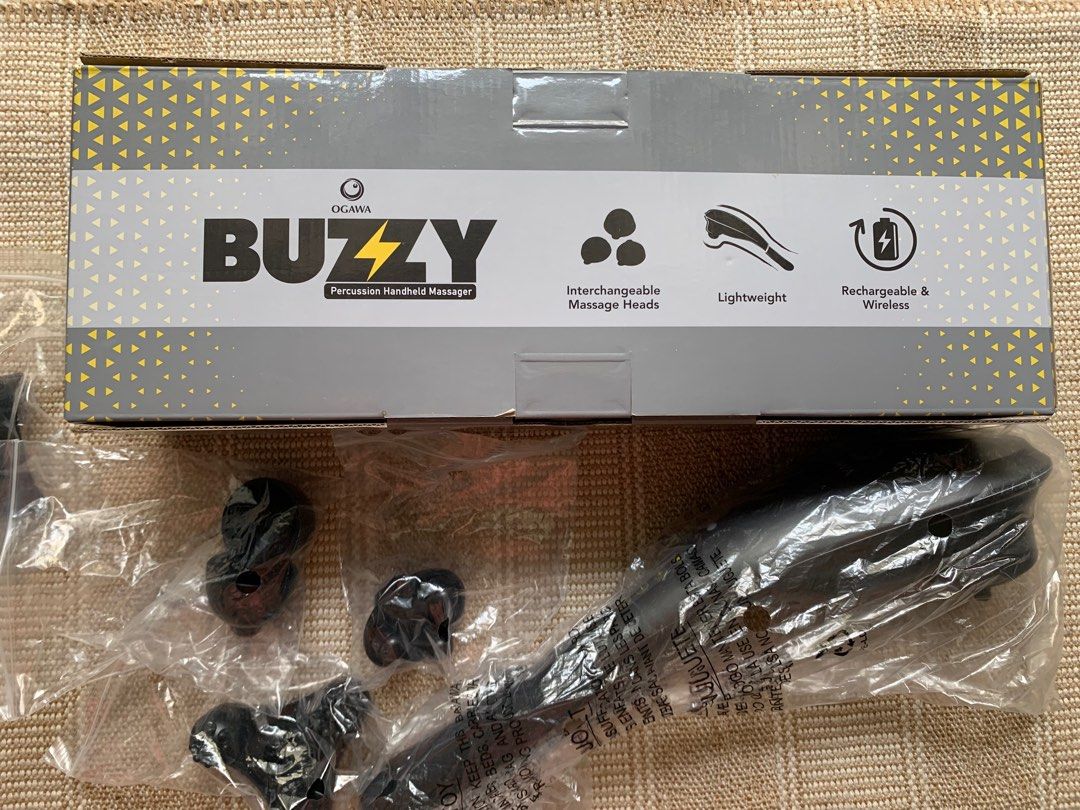 Ogawa Buzzy Touch Handheld Massager (Category: Massage Devices) located in Manila. Submitted by tammstuffs (Listing ID 1320686395, Image 1). Description: Original price: Php 9,990 RFS: wife gifted me a massage chair The All new OGAWA Buzzy Touch Handheld Massager is designed ergonomically to reach hard-to-reach areas with up to 5 levels of intensity which can be adjusted with just a click of a button. This handheld massager is portable, rechargea