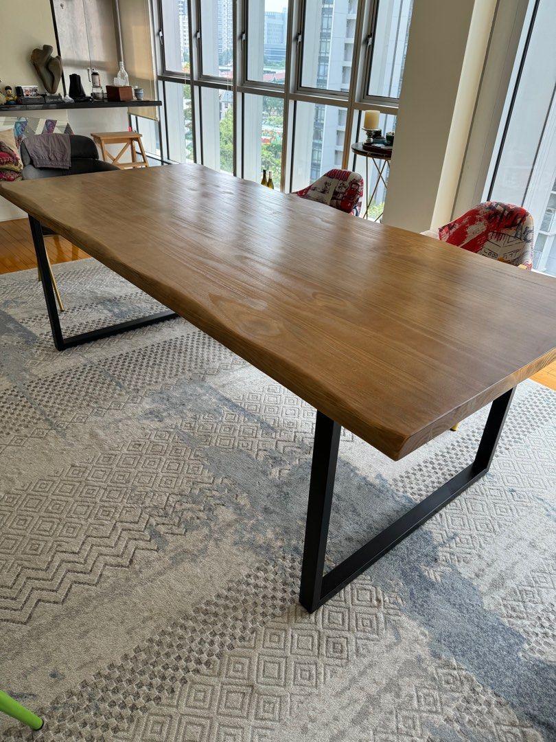 Solid Wood Large Dining Table (Category: Tables & Sets) located in Singapore. Submitted by ming136 (Listing ID 1320601489, Image 3). Description: Very Large solid wood pine dining table for sale. Some user marks on table top but in very good condition. Metal legs are solid 220x100 Message for info. Selling because moving. .