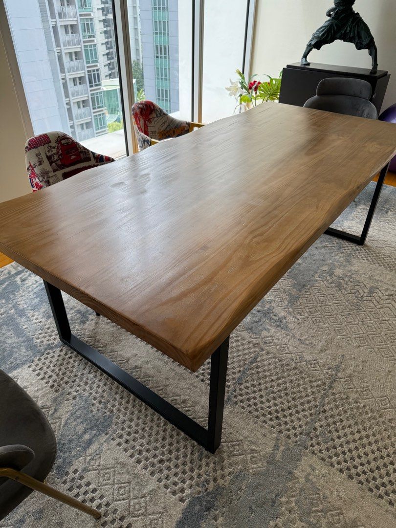 Solid Wood Large Dining Table (Category: Tables & Sets) located in Singapore. Submitted by ming136 (Listing ID 1320601489, Image 1). Description: Very Large solid wood pine dining table for sale. Some user marks on table top but in very good condition. Metal legs are solid 220x100 Message for info. Selling because moving. .