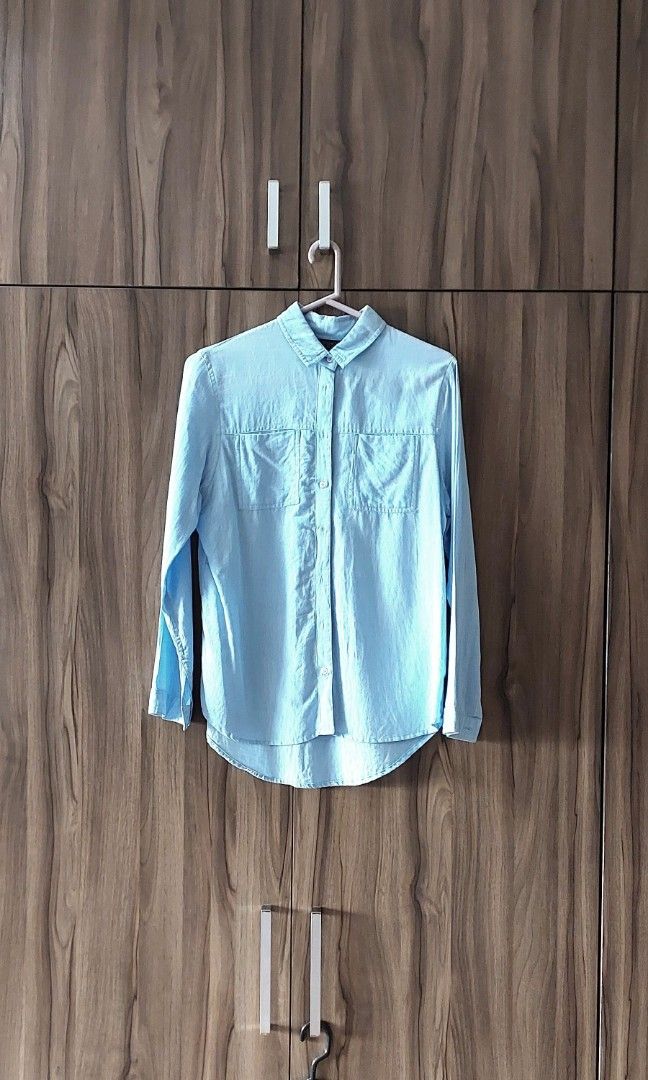 Topshop light blue shirt (like new) (Category: Shirts) located in Paranaque City. Submitted by ddddsy (Listing ID 1320611110, Image 1). Description: Topshop light blue shirt size: EU 36~38 (tight fitting for 38) 100% authentic!.