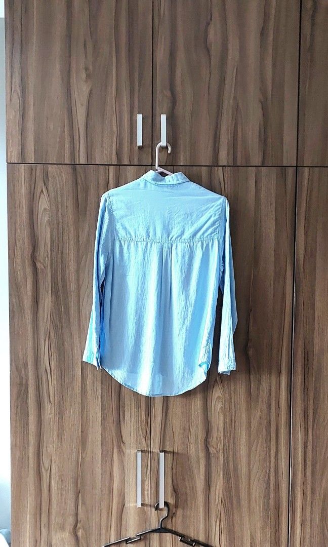 Topshop light blue shirt (like new) (Category: Shirts) located in Paranaque City. Submitted by ddddsy (Listing ID 1320611110, Image 2). Description: Topshop light blue shirt size: EU 36~38 (tight fitting for 38) 100% authentic!.