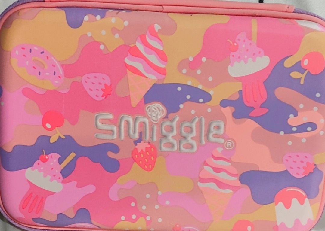 Authentic Smiggle Large Pink/Peach/Purple Pencil Case (Category: Babies & Kids Fashion) located in Cavite. Submitted by live_once (Listing ID 1320919015, Image 1). Description: Guaranteed Authentic Personally Bought in Smiggle HK Brand New with Tags,.Can be given as Gift Large Pencil Case, Peach/Pink/Purple Color Manual Measurement, 8x5 inches No flaws, No issue, Working Zippers, Clean inside and out Posted Price is Fixed.