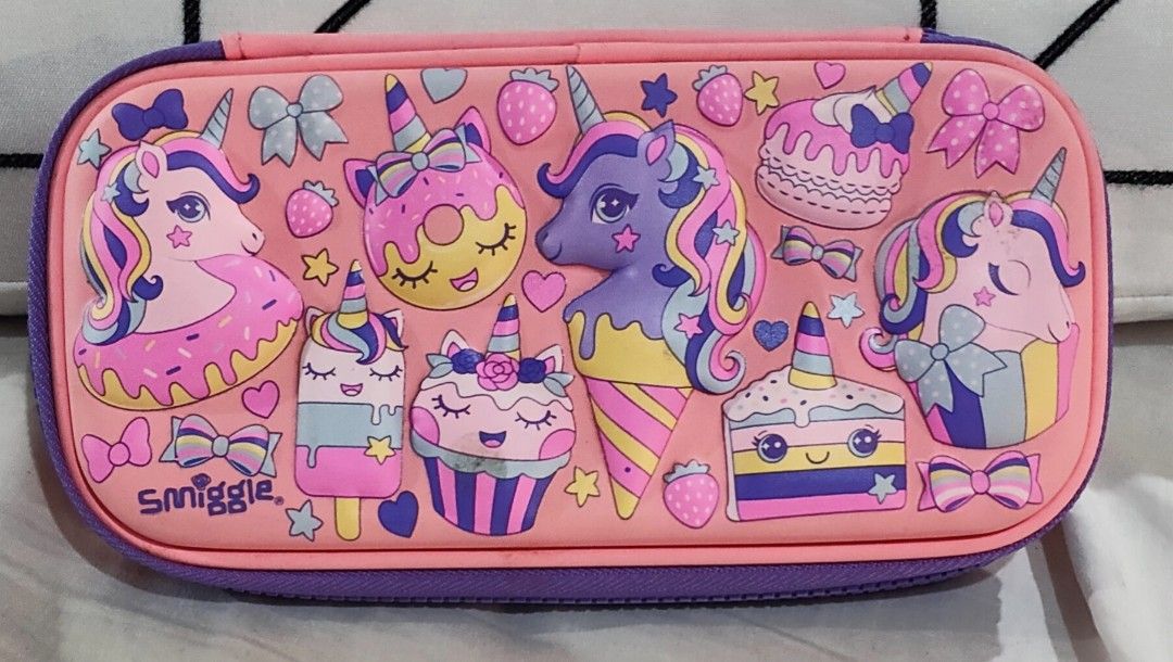 Authentic Smiggle Pink Unicorn Party Pencil Case (Category: Babies & Kids Fashion) located in Cavite. Submitted by live_once (Listing ID 1320914719, Image 1). Description: Guaranteed Authentic Personally Bought in Smiggle HK Brand New with Tags, can be gifted No Issue, no Flaw, Working Zippers, Clean inside and outside Embossed Design, Pink and Purple Color, Unicorn Party Fixed Price.