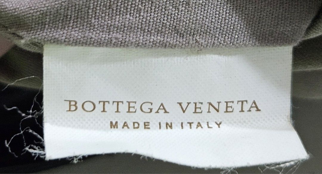 Bottega Veneta sling bag (Category: Luxury Bags & Wallets) located in Las Pinas. Submitted by 05.11minimalist (Listing ID 1320887463, Image 3). Description: Bottega Veneta Intrecciato sling crossbody bag. Black. Made in Italy. Dimensions: 11" x 11". Signed hardware. No missing tags. Zipper opens and closes smoothly. Sling, no cracks leather accent. Clean interior, no foul odor. No rips, runs or holes interior and exterior of bag. Very small rub o