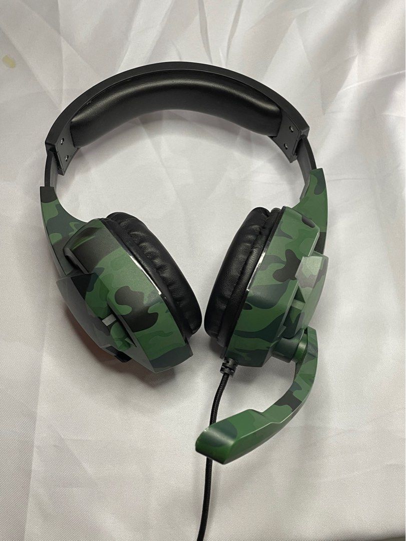 Camouflage Gaming Headphone with Microphone | Adjustable Universal Wired Headset Built in Rotatable Microphone (Category: Headphones & Headsets) located in Paranaque City. Submitted by homefashionbymaple (Listing ID 1320856405, Image 1). Description: ♦️No issues. Item in working good condition. No box ✅ Delivery via J&T / Lalamove ✅ Payment thru BDO, BPI, Gcash 🔸 message for pics & videos of the product (in working condition, other details)🔸.