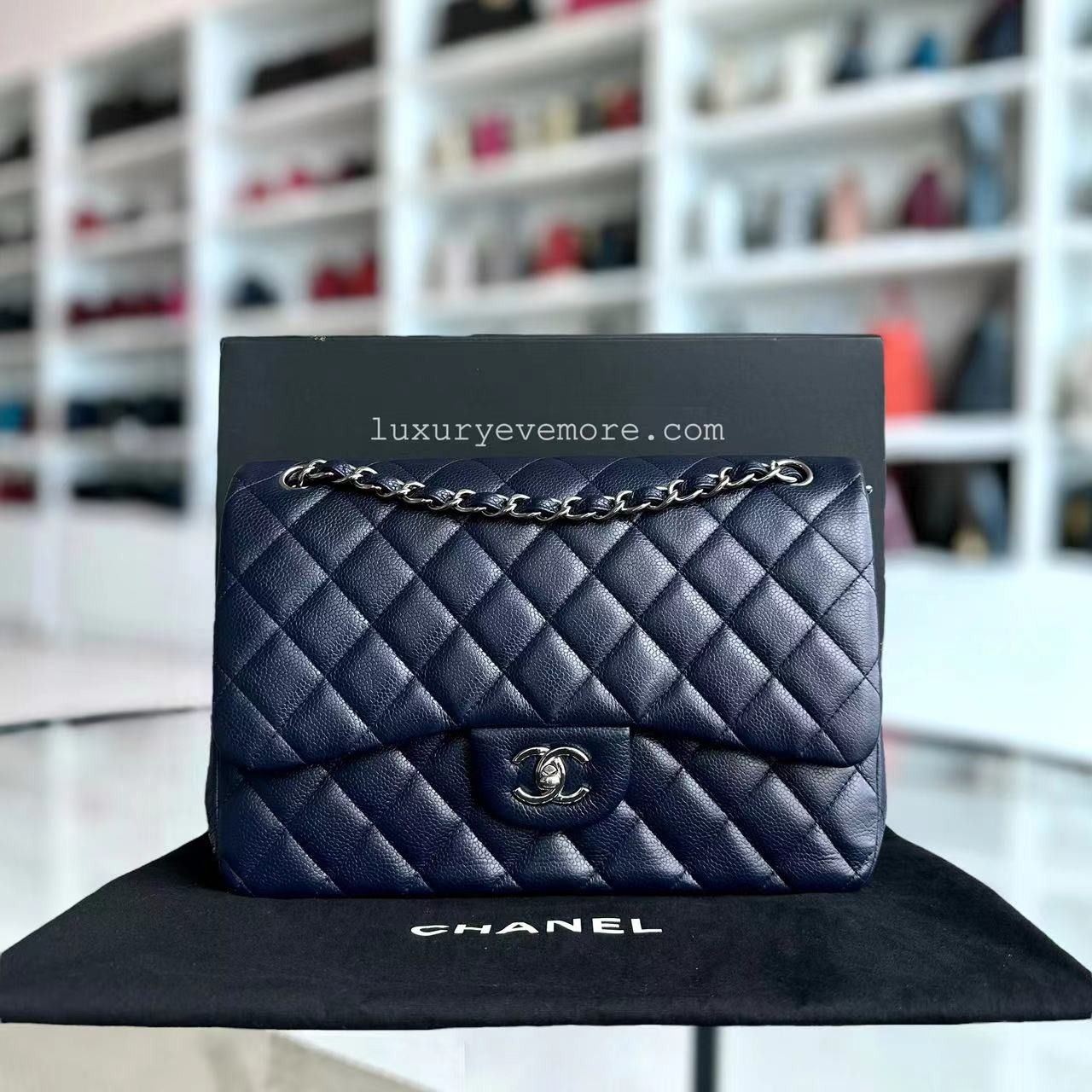 Chanel black caviar jumbo double flap silver hardware shop