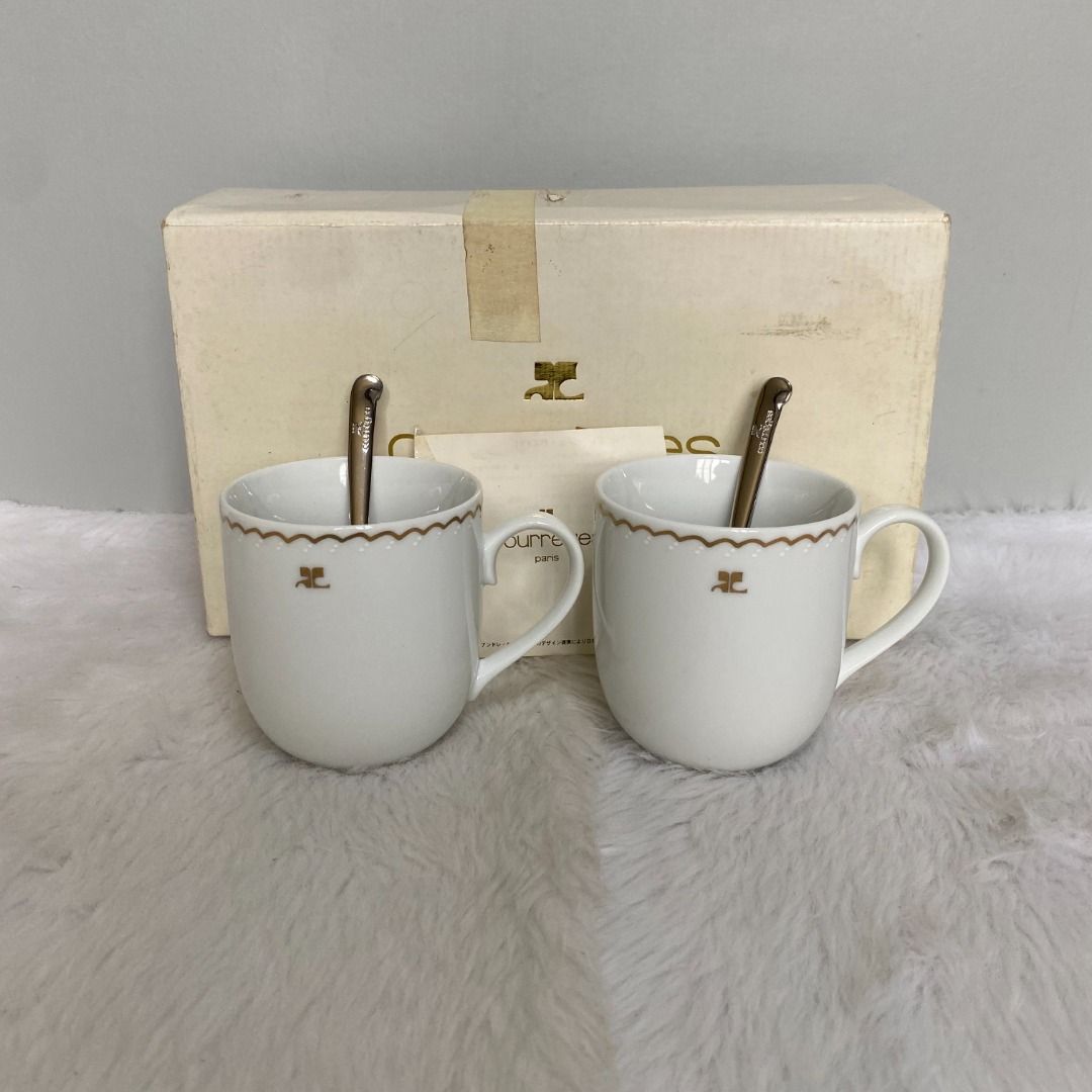 Courreges White Logo Painted Mugs Teaspoons Set (Category: Coffee & Tea Tableware) located in Consolacion. Submitted by posh_avenue_home (Listing ID 1320842990, Image 2). Description: New with box. 2 Coffee Mugs. Stainless teaspoons. 100% Authentic!!!.
