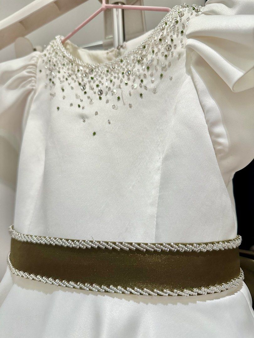 Edward Teng white gown (Category: Babies & Kids Fashion) located in Makati City. Submitted by corplady (Listing ID 1320876533, Image 3). Description: Waist: 22” Bust: 22.5” Shoulder to waist: 10” Dress length: 36” I’m not certain about the fabric, but it looks like crepe-backed satin with a stiff net petticoat. The gown comes with a detachable belt. Used once for about an hour. You can do a fitting first before making the payment. Meeting place: 