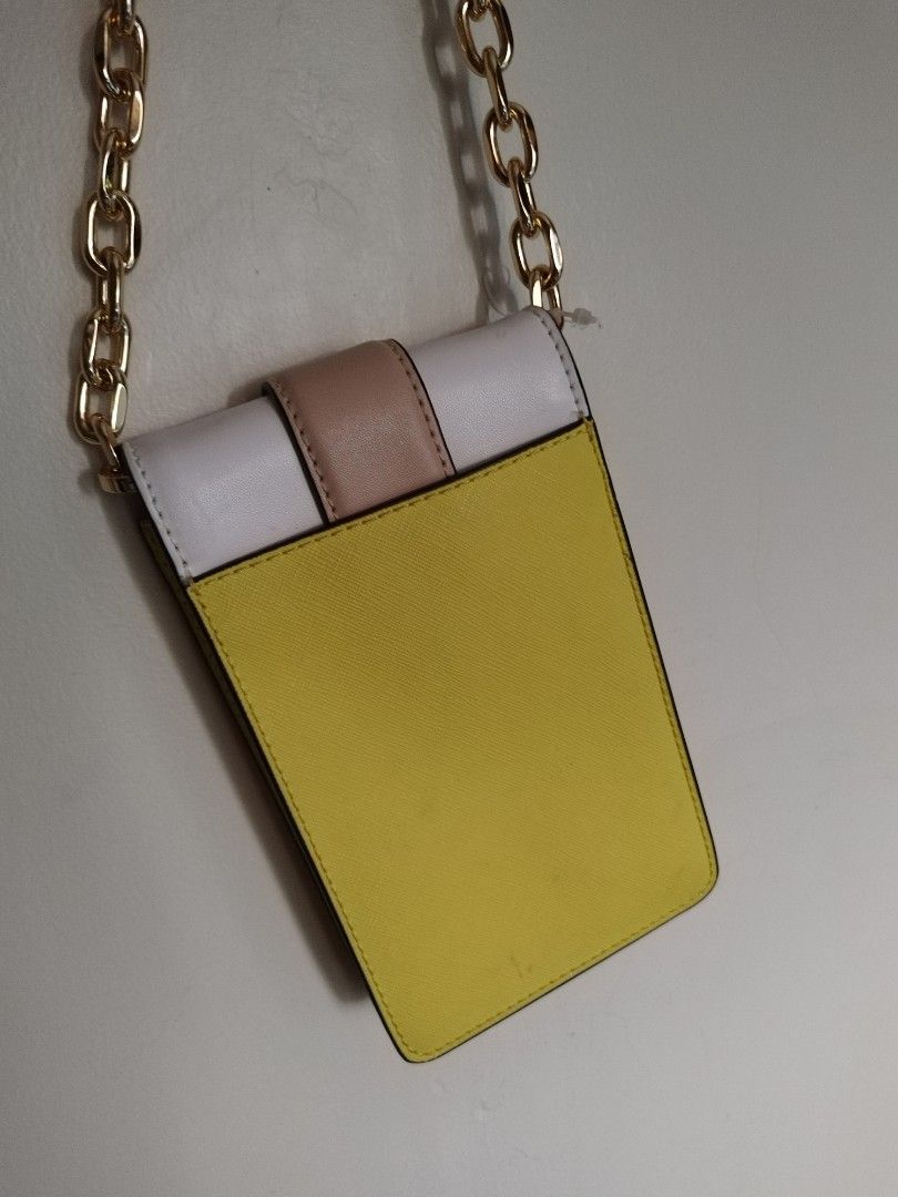 Michael kors cellphone and wallet body con (Category: Luxury Bags & Wallets) located in Quezon City. Submitted by prettypetite01 (Listing ID 1320819465, Image 3). Description: 2 in 1 may card holder said loob medyo may signs ng usage money back pag napatunayan na peke.