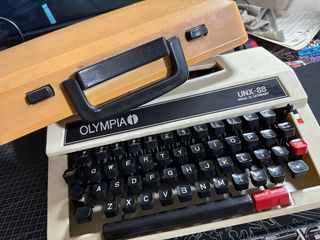 Vintage Olympia UNX-88 Portable Manual Typewriter