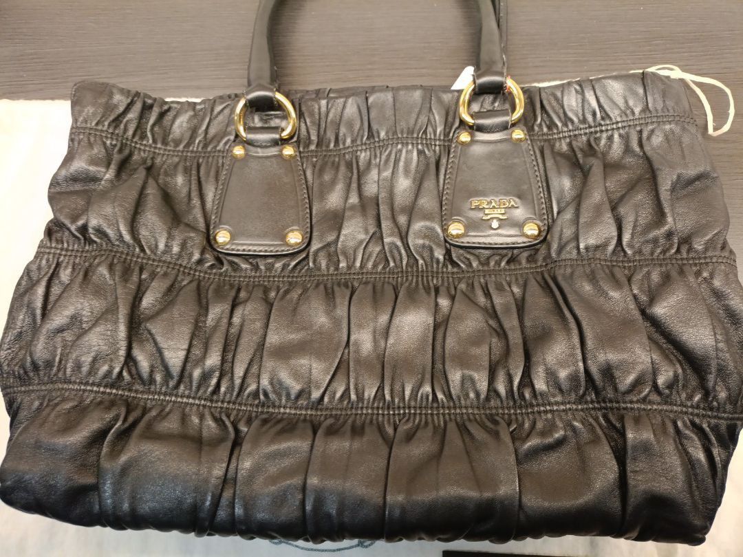Prada bag (Authentic) (Category: Bags & Wallets) located in Singapore. Submitted by janjudy (Listing ID 1320846873, Image 2). Description: Authentic bag Lambskin Gold Hardware.