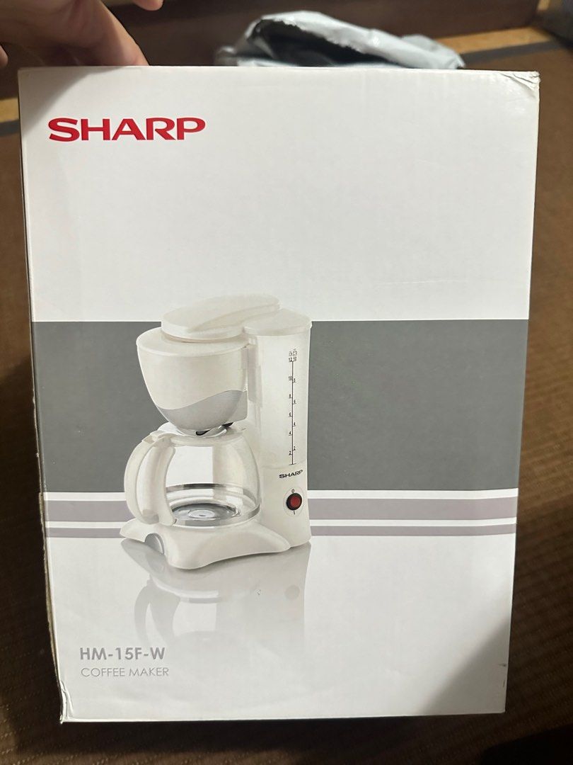 Sharp coffee maker (Category: Coffee & Tea Tableware) located in Manila. Submitted by agoraphobicmin (Listing ID 1320922372, Image 1). Description: Unopened Sharp coffee maker SRP 1298 RFS: will not use it.
