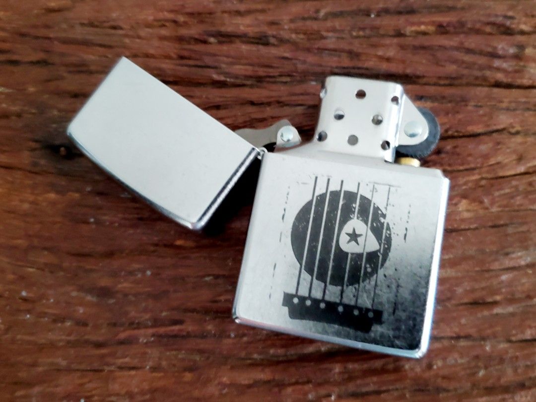 Zippo Marlboro Guitar Strings and Pick 2008 (Category: Musical Instruments) located in Marikina City. Submitted by knifeandtoolphilippines (Listing ID 1320839733, Image 2). Description: Fixed Price Brand New/Unfired Complete with box.