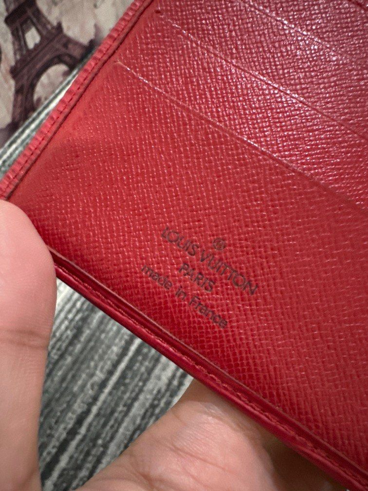 Authentic Louis Vuitton Epi Red Bifold Wallet (Category: Luxury Bags & Wallets) located in Manila. Submitted by ganned (Listing ID 1317863235, Image 3). Description: LV Epi Mens Bifold Wallet in red color Well used but epi leather still in strong condition.
