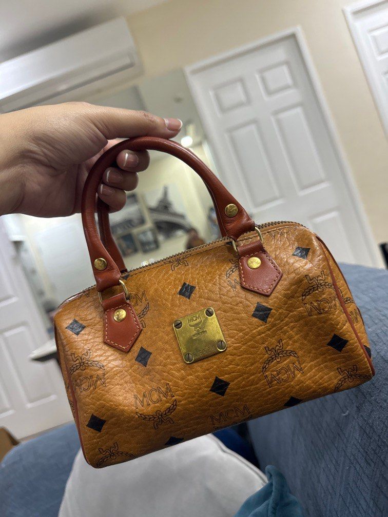Authentic MCM Cognac Nano (Category: Luxury Bags & Wallets) located in Manila. Submitted by ganned (Listing ID 1317862126, Image 1). Description: MCM Cognac Nano bought from Japan Well used condition .