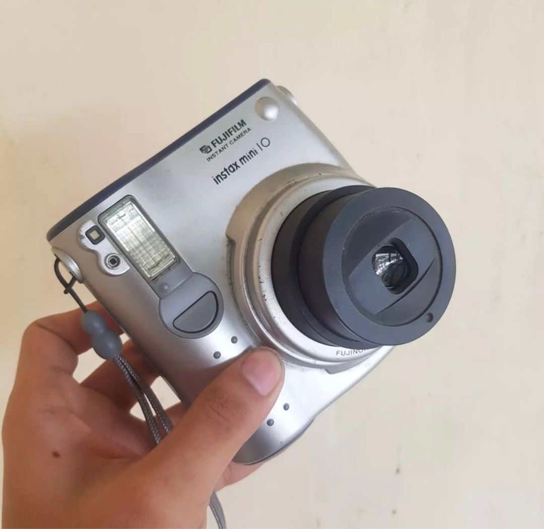 Instax Mini 10 (Category: Cameras) located in Makati City. Submitted by raisagennel (Listing ID 1317775097, Image 2). Description: The camera is: * Body Cosmetics: 9/10 * Battery & Film Tested * Viewfinder is CLEAN * Lens is CLEAN * Shutter & Roller are OPERATIONAL * Shutterspeeds are OPERATIONAL * Flash is OPERATIONAL * Self Timer is OPERATIONAL FREEBIES: * FREE ORIGINAL STRAP Modes of Payment: * BPI * GCash [Price is negotiable if fast transact