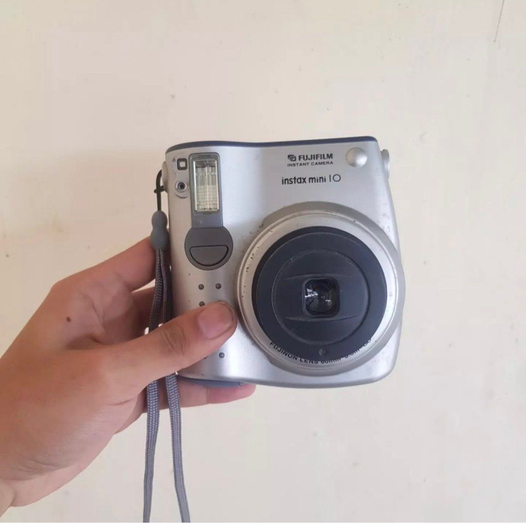 Instax Mini 10 (Category: Cameras) located in Makati City. Submitted by raisagennel (Listing ID 1317775097, Image 1). Description: The camera is: * Body Cosmetics: 9/10 * Battery & Film Tested * Viewfinder is CLEAN * Lens is CLEAN * Shutter & Roller are OPERATIONAL * Shutterspeeds are OPERATIONAL * Flash is OPERATIONAL * Self Timer is OPERATIONAL FREEBIES: * FREE ORIGINAL STRAP Modes of Payment: * BPI * GCash [Price is negotiable if fast transact